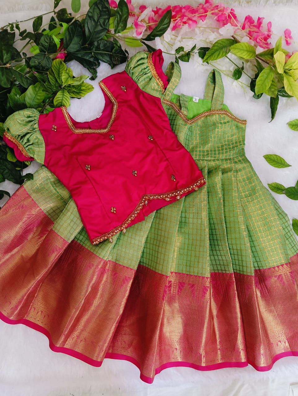 Dress up your little princess in this Pink & Green Silk Gown with Golden Zari Border