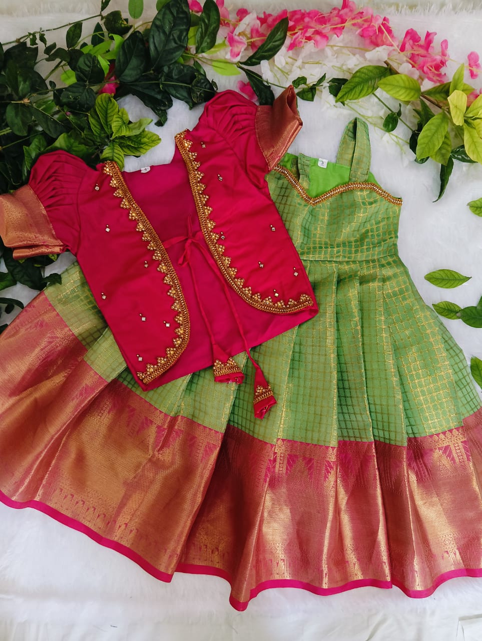 Dress up your little princess in this Pink & Green Silk Gown with Golden Zari Border