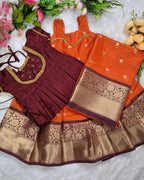 A rich and vibrant Maroon &amp; Orange with Gold zari border combination