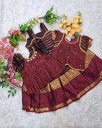 A rich and elegant Maroon with Gold zari border combination