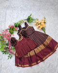 A rich and elegant Maroon with Gold zari border combination