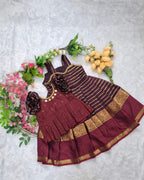 A rich and elegant Maroon with Gold zari border combination