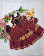 A rich and elegant Maroon with Gold zari border combination