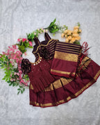 A rich and elegant Maroon with Gold zari border combination