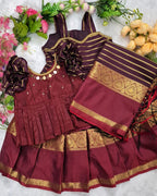 A rich and elegant Maroon with Gold zari border combination