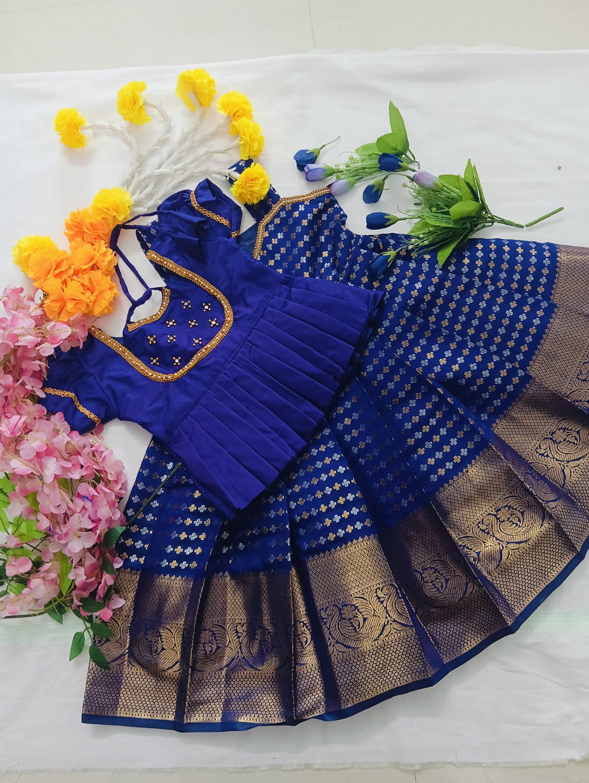Kids Pattu Pavadai Set in a luxurious Deep Violet/Indigo rich combo with Gold and Silver Zari work.