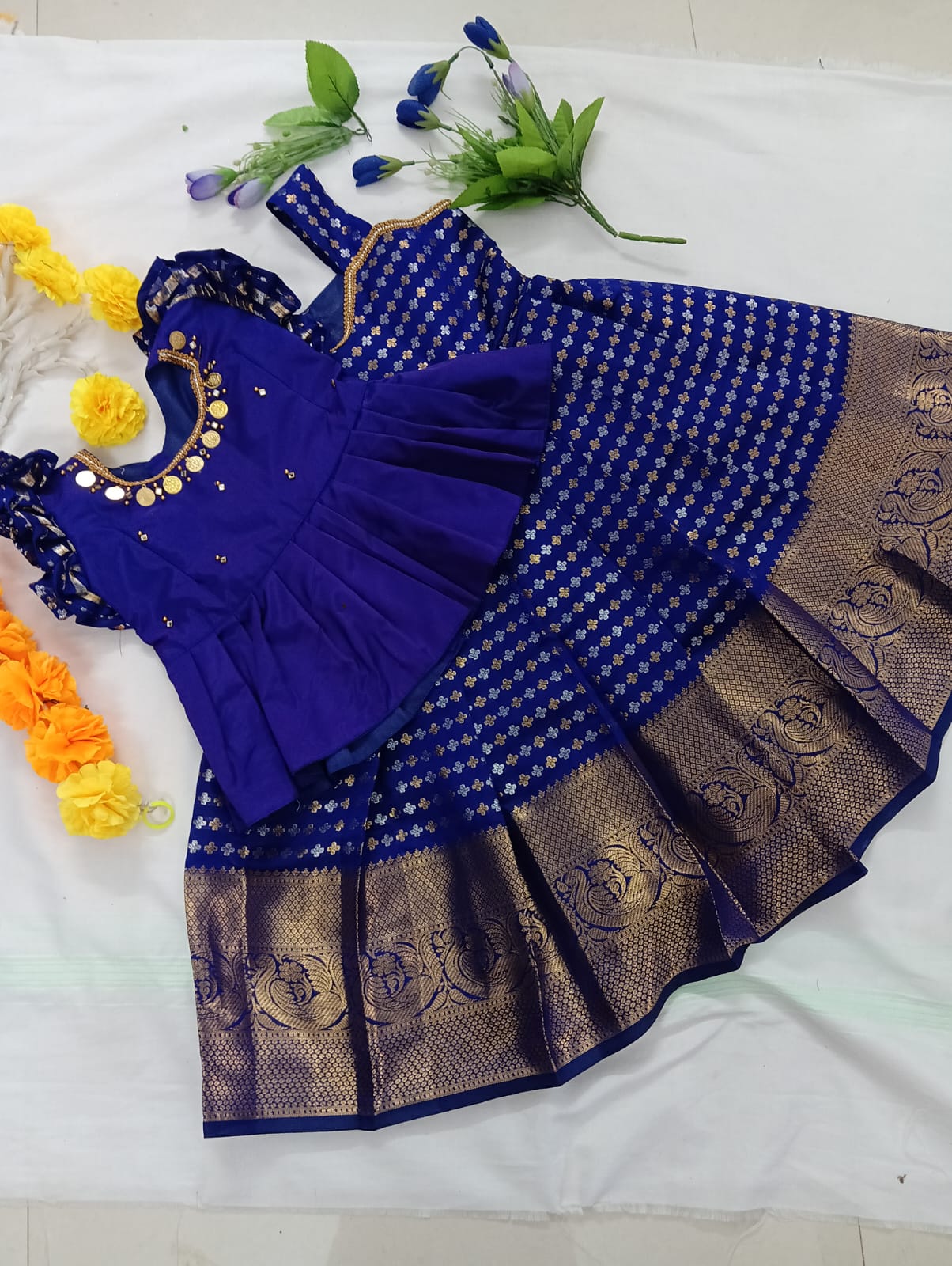 Kids Pattu Pavadai Set in a luxurious Deep Violet/Indigo rich combo with Gold and Silver Zari work.
