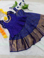 Kids Pattu Pavadai Set in a luxurious Deep Violet/Indigo rich combo with Gold and Silver Zari work.