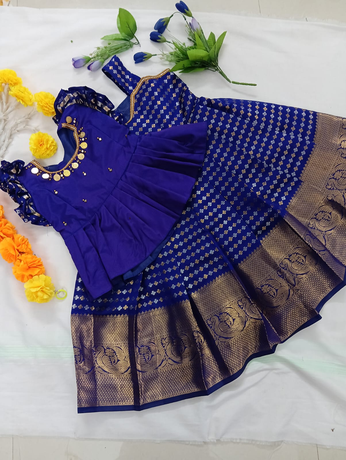 Kids Pattu Pavadai Set in a luxurious Deep Violet/Indigo rich combo with Gold and Silver Zari work.