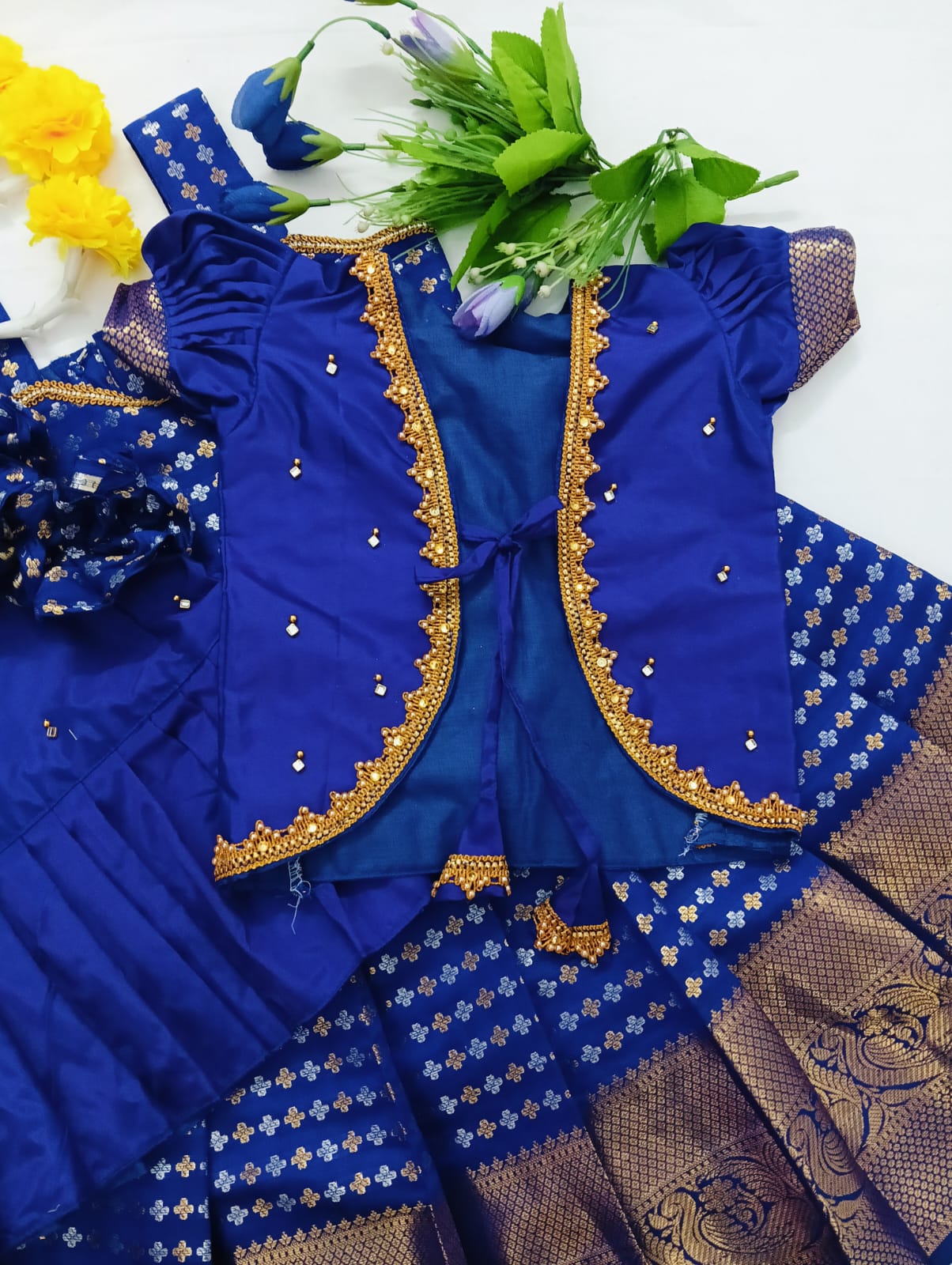 Kids Pattu Pavadai Set in a luxurious Deep Violet/Indigo rich combo with Gold and Silver Zari work.