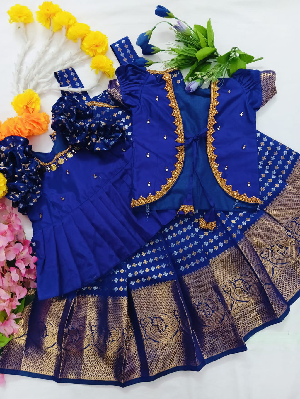 Kids Pattu Pavadai Set in a luxurious Deep Violet/Indigo rich combo with Gold and Silver Zari work.
