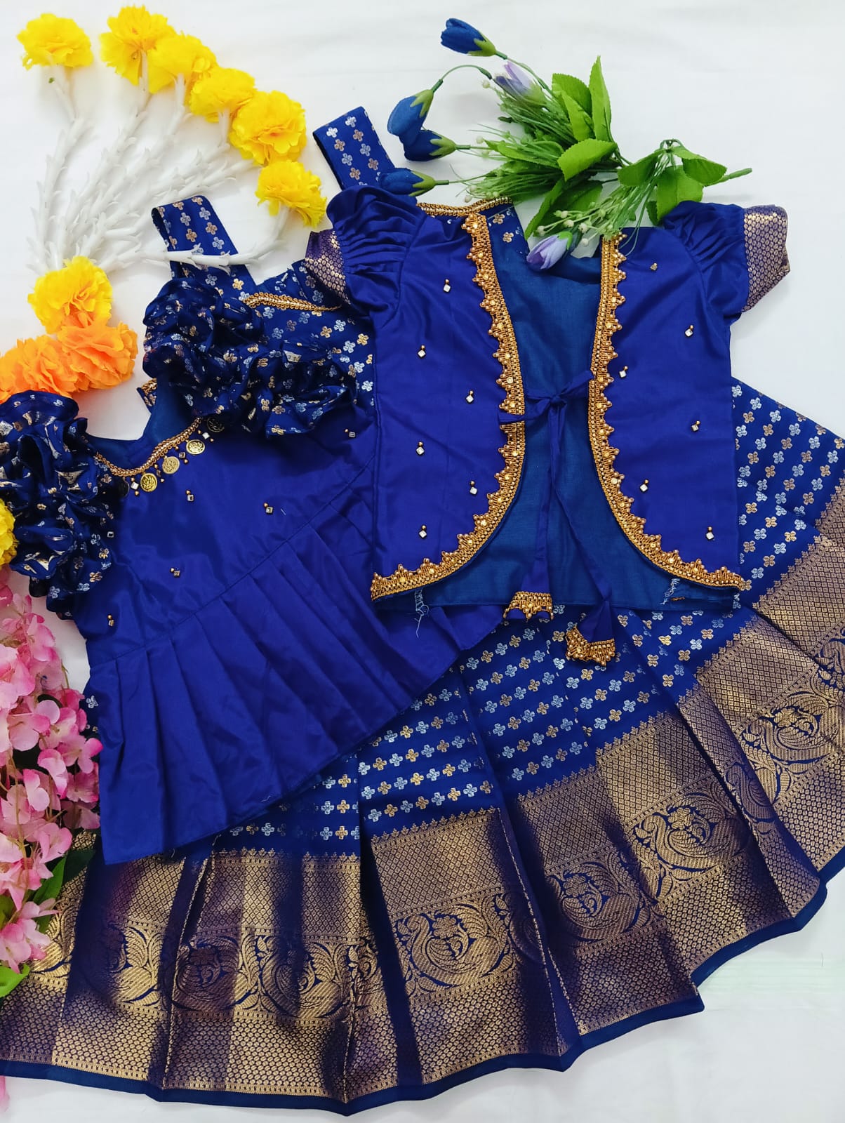 Kids Pattu Pavadai Set in a luxurious Deep Violet/Indigo rich combo with Gold and Silver Zari work.