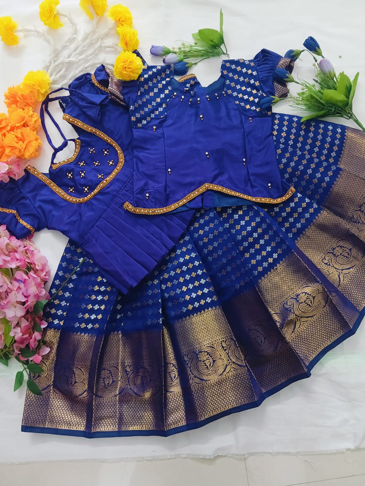 Kids Pattu Pavadai Set in a luxurious Deep Violet/Indigo rich combo with Gold and Silver Zari work.