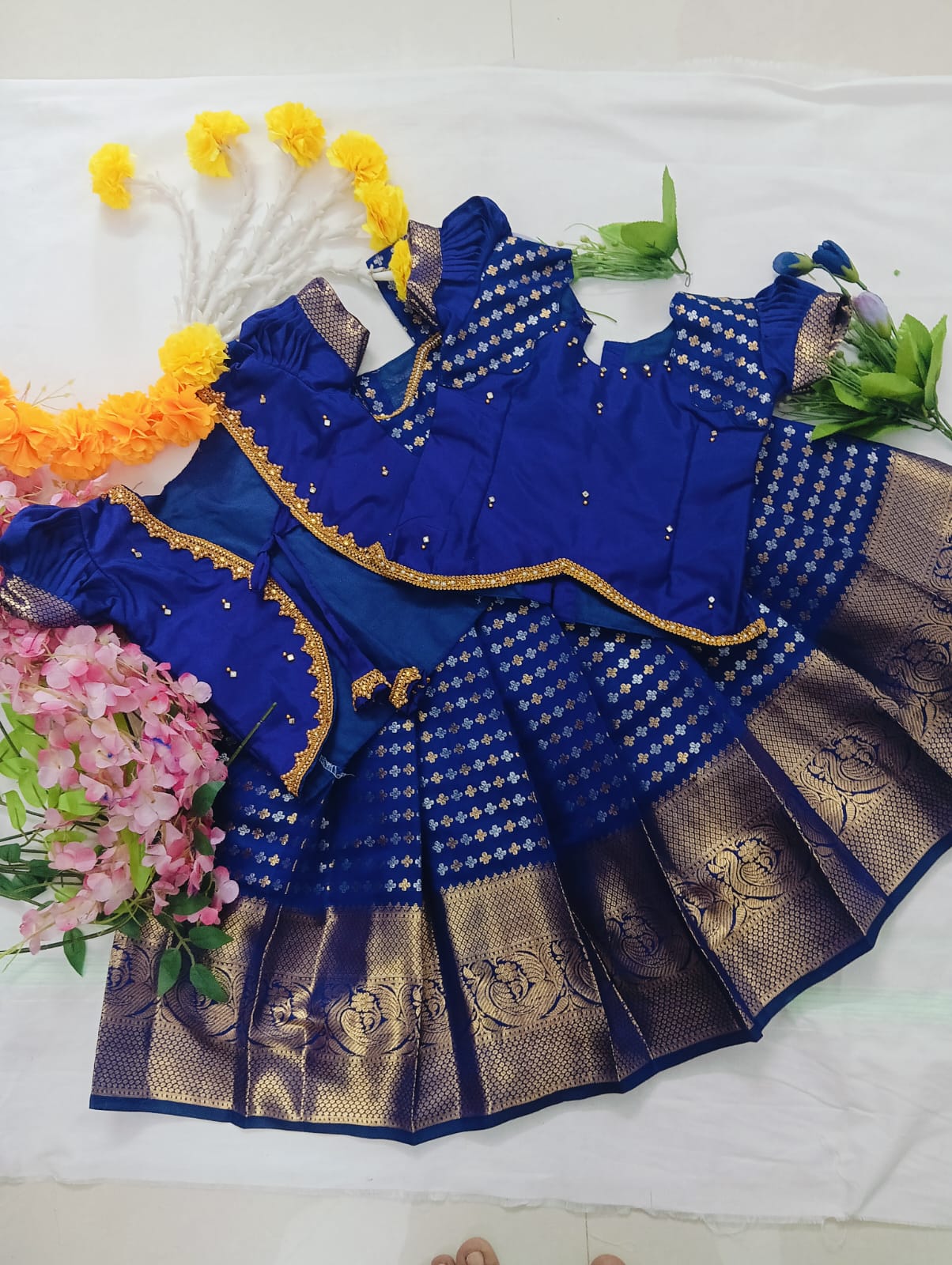 Kids Pattu Pavadai Set in a luxurious Deep Violet/Indigo rich combo with Gold and Silver Zari work.
